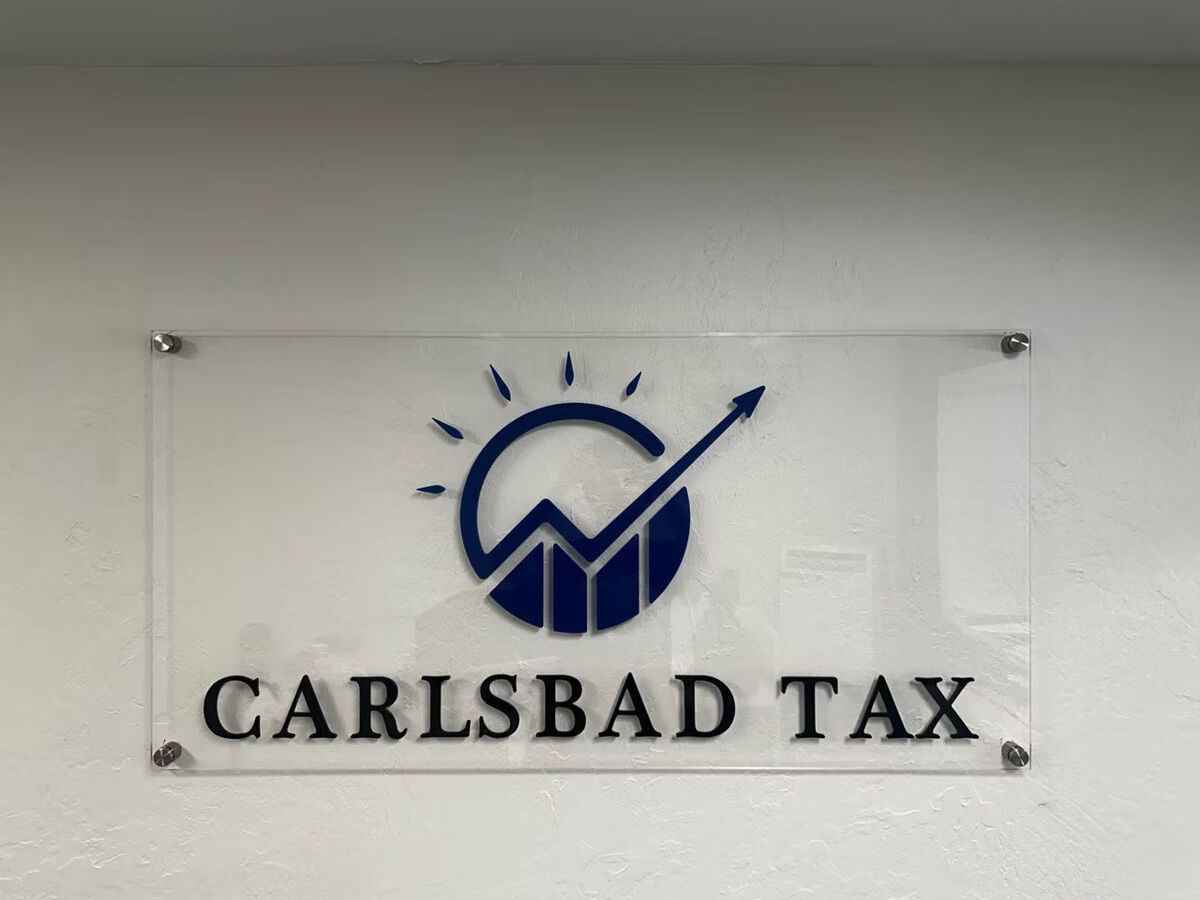 Clear acrylic lobby sign for Carlsbad Tax